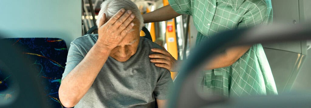 older man injured while riding on a bus